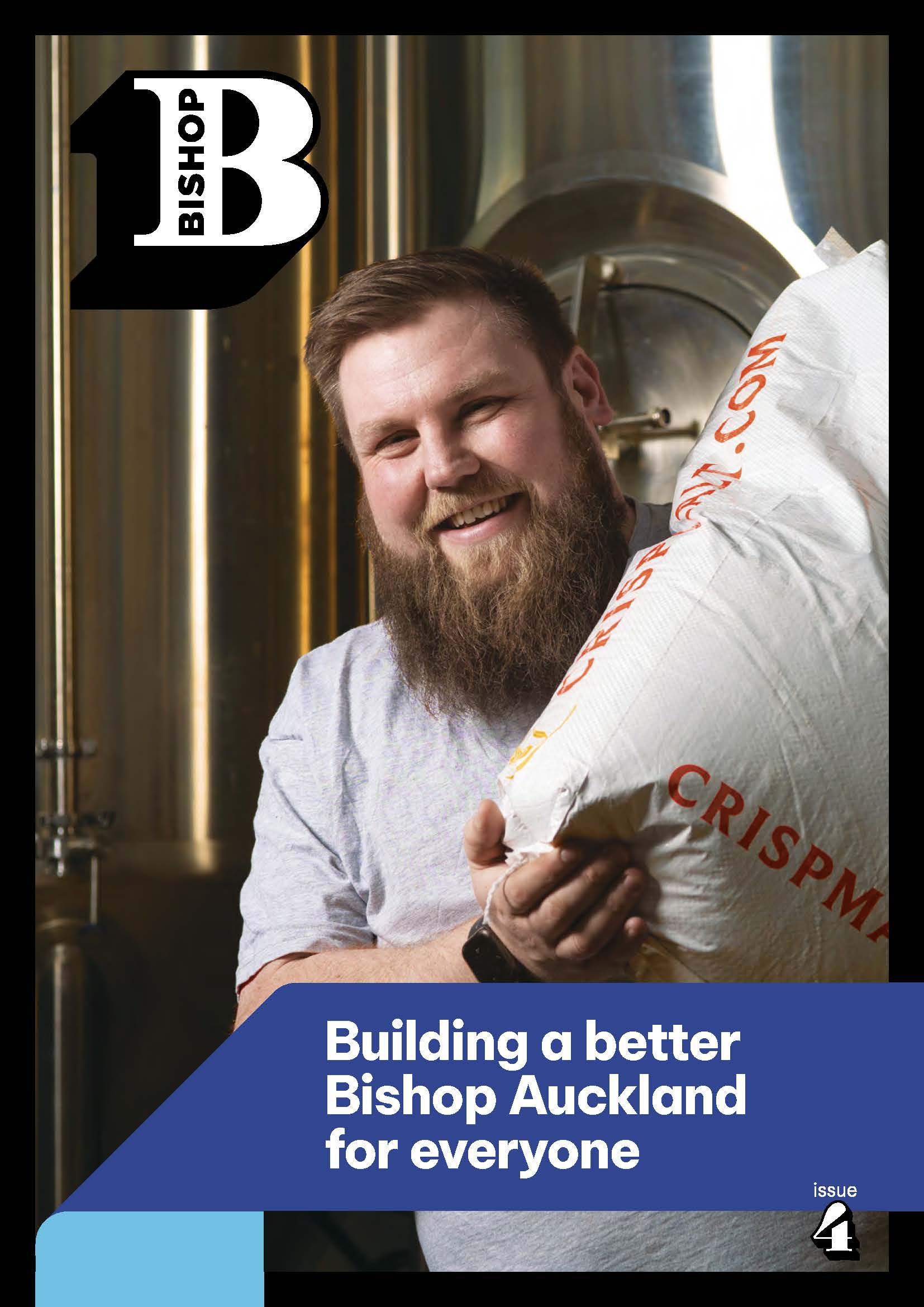 Ali Wild from Caps Off standing looking down the camera whilst holding a bag of hops.