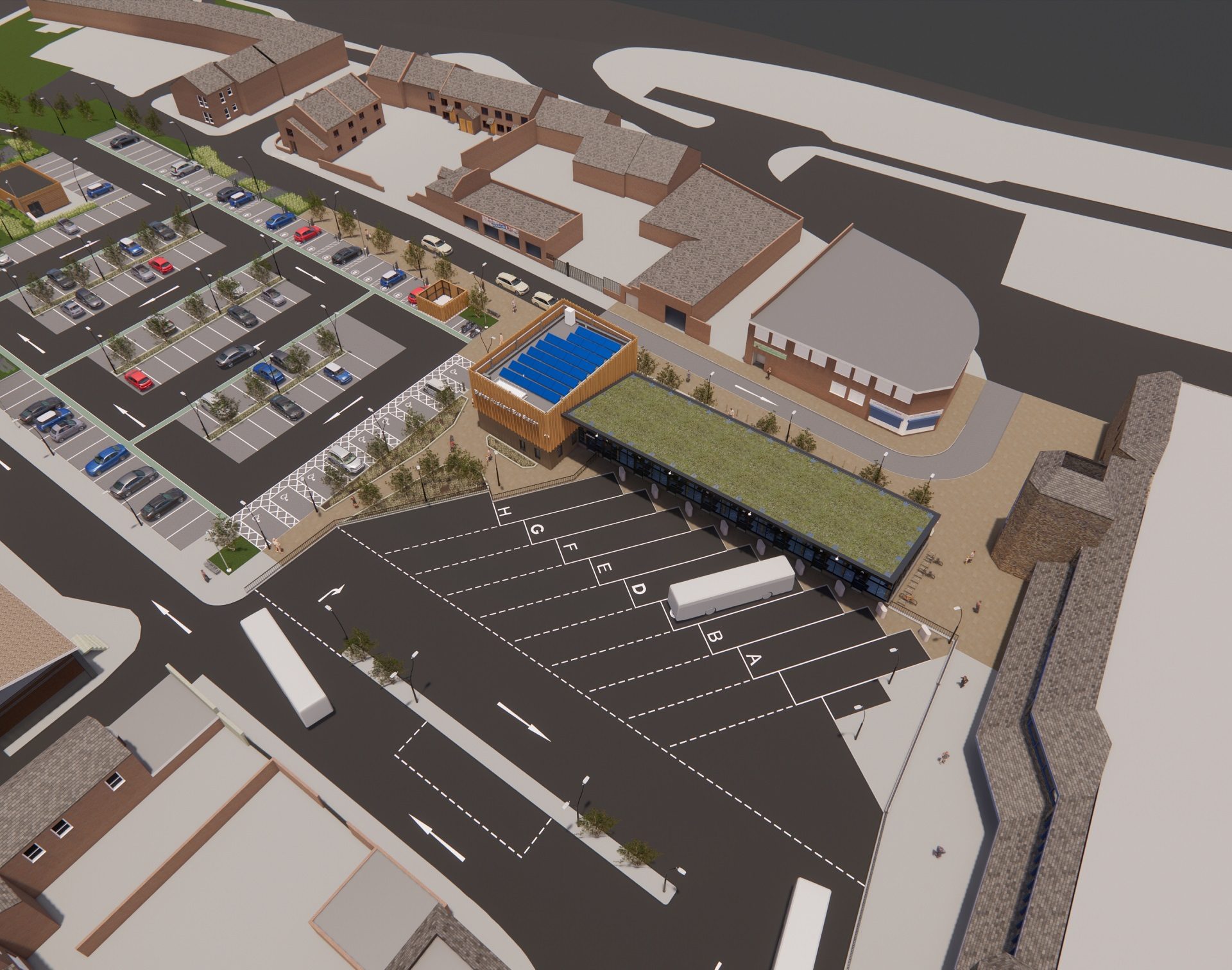 Aerial view of the proposed bishop auckland bus station. Building with green roof and bus parking spaces at the front.