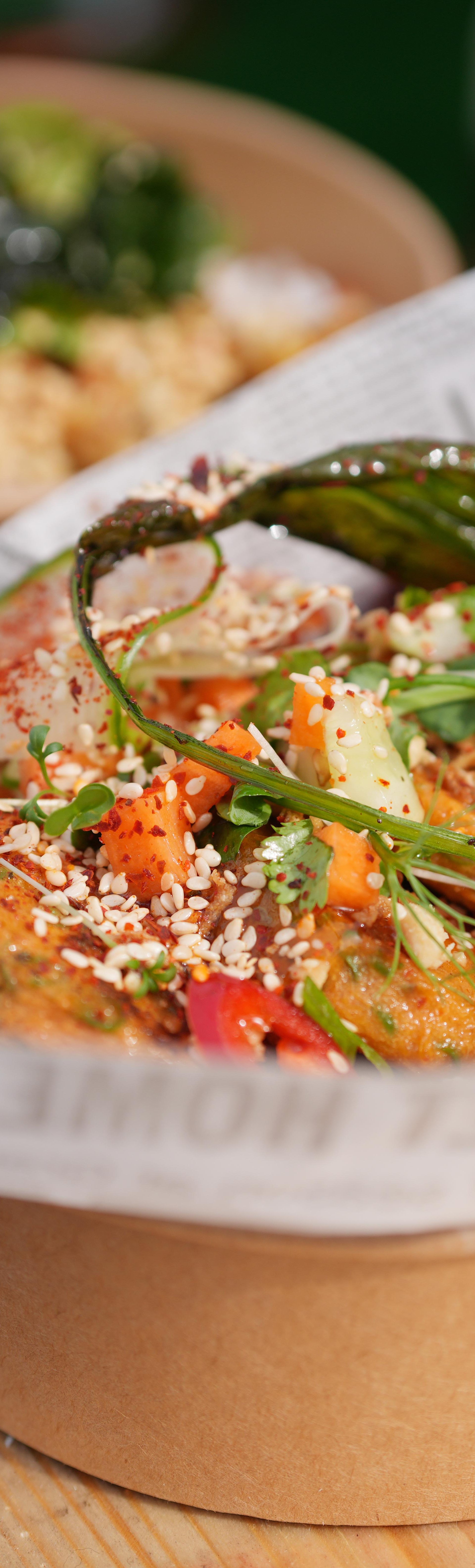 Food presented in a takeaway brown circular container